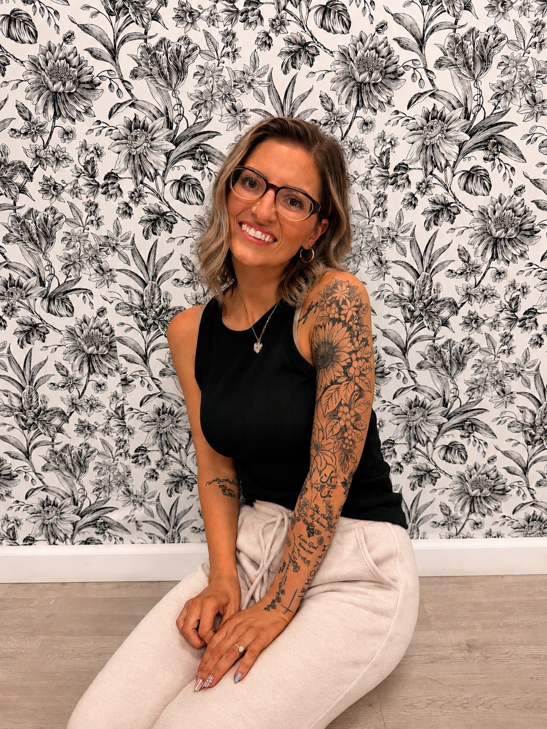 Abbagail, owner and artist at The Haven Studio, smiling in her studio