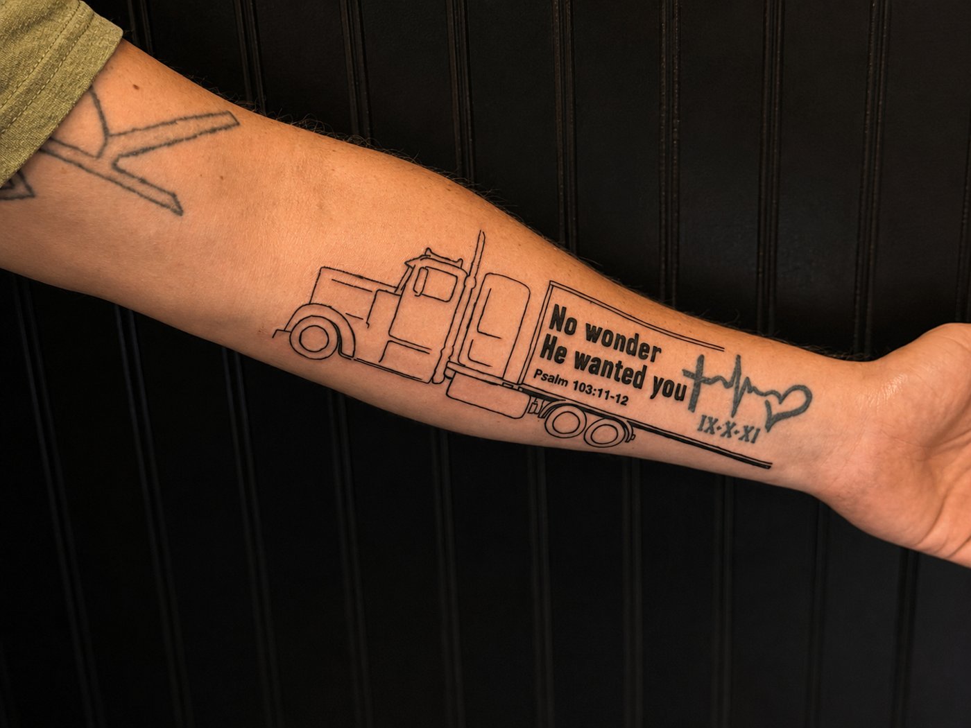 Single-line drawing of a semi truck with a memorial verse and heartbeat on a forearm
